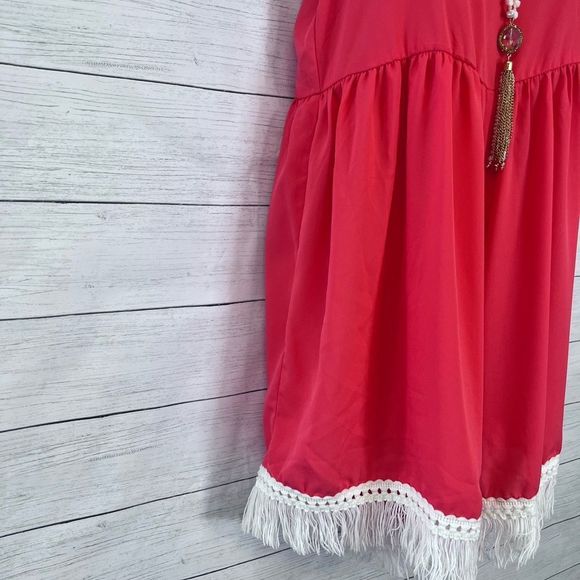 Boutique Joyce Flowy Spaghetti Strap Romper with Tassel Detail 💗 - Picture 2 of 9